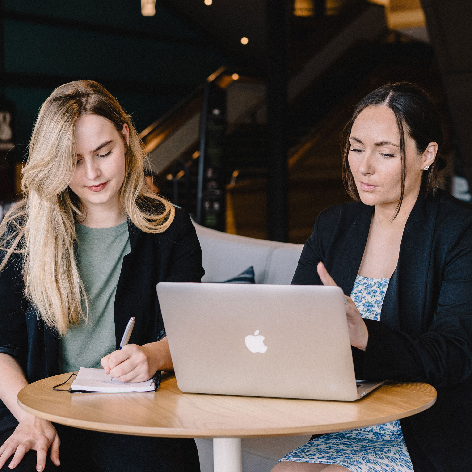 Connie and Molly Sishton working in a cafe